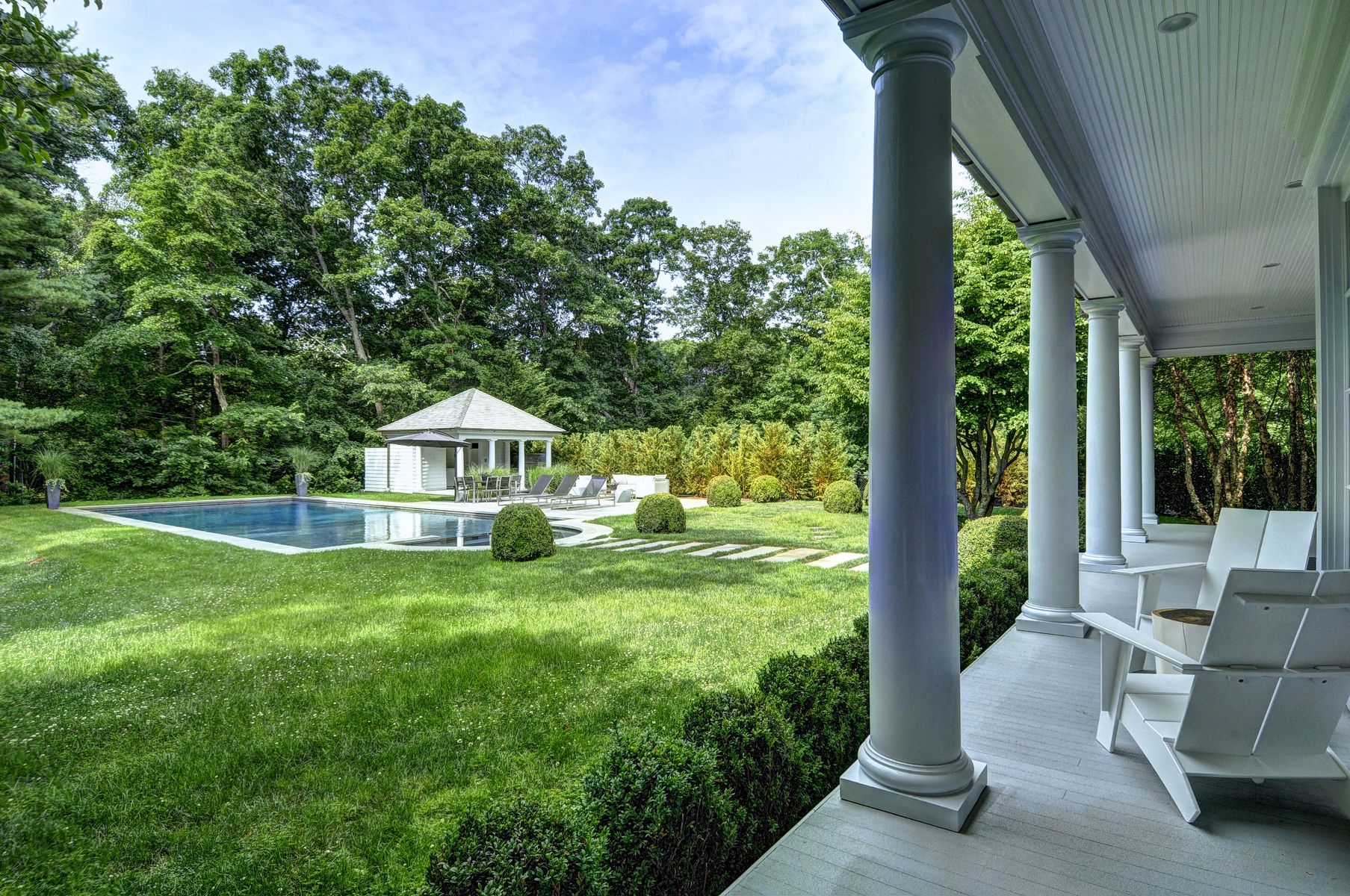 11 Jones Cove Road East Hampton, NY 11937 - Photo 22 of 25 a view of a house with a yard deck and a patio