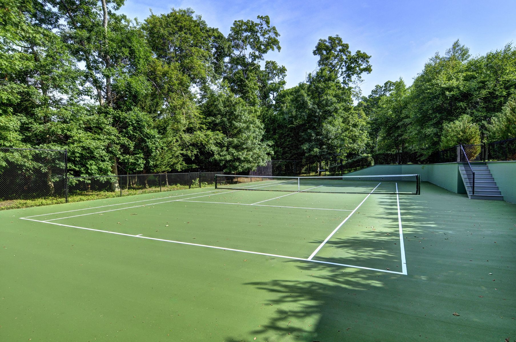 11 Jones Cove Road East Hampton, NY 11937 - Photo 5 of 25 a view of a tennis court