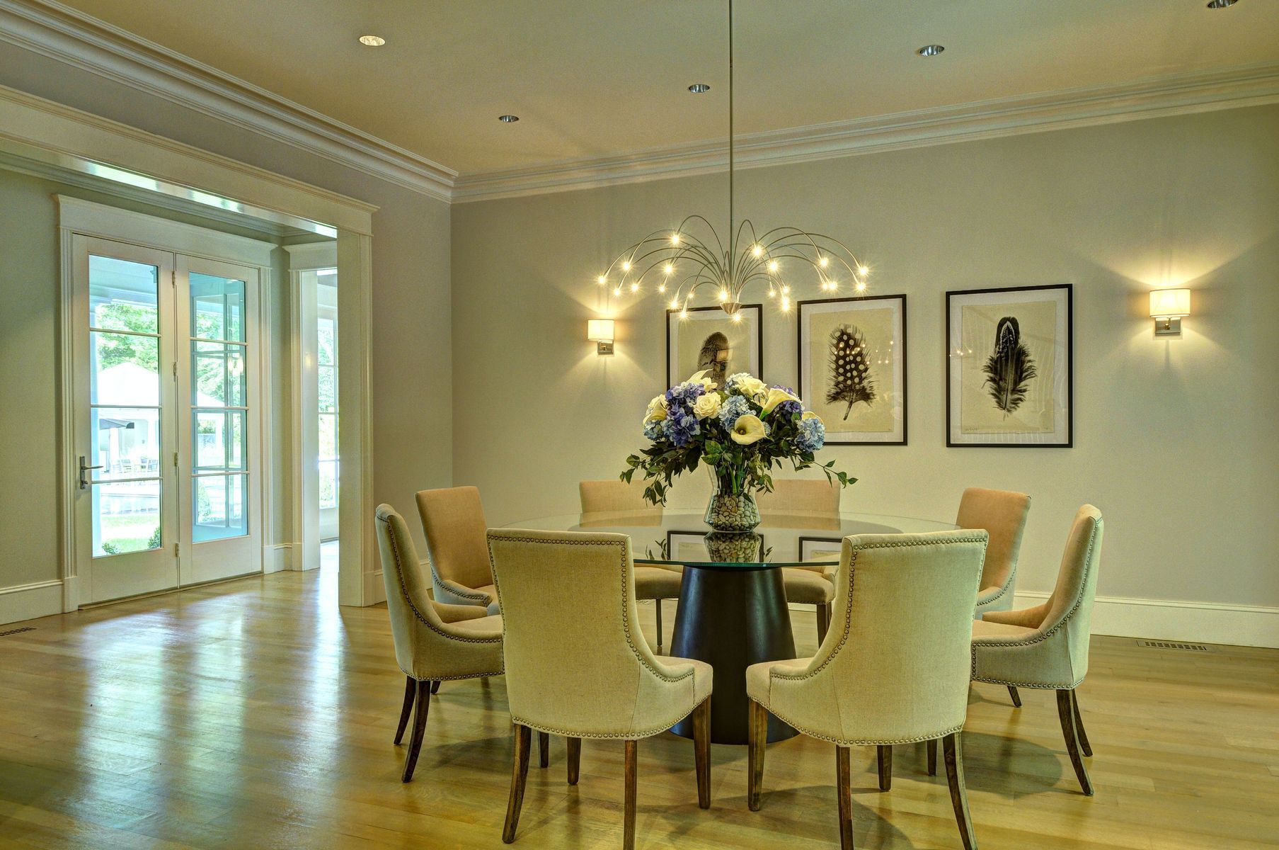 11 Jones Cove Road East Hampton, NY 11937 - Photo 9 of 25 a dining room with furniture a chandelier and wooden floor