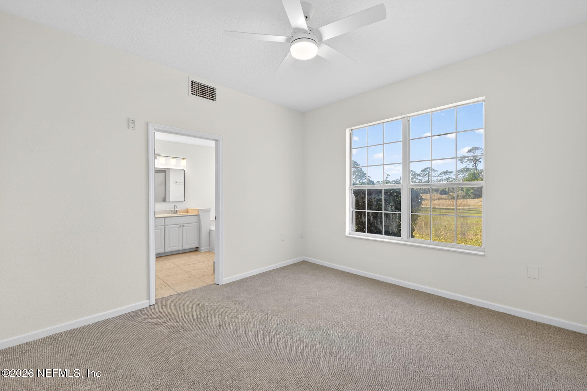 1610 Prestwick Place St. Augustine, FL 32086 - Photo 24 of 41 an empty room with a empty space and windows