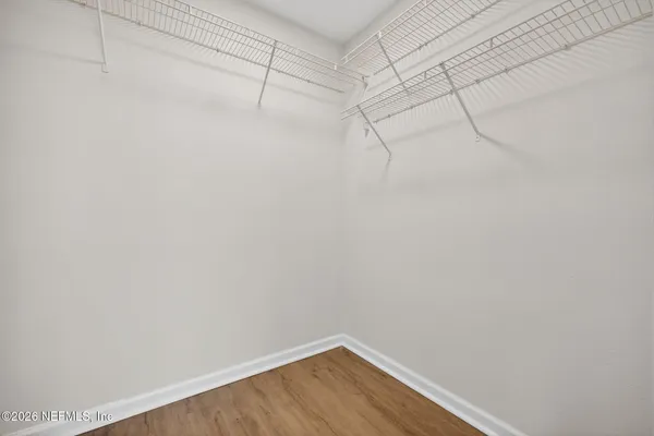 a view of a room with racks on the wall