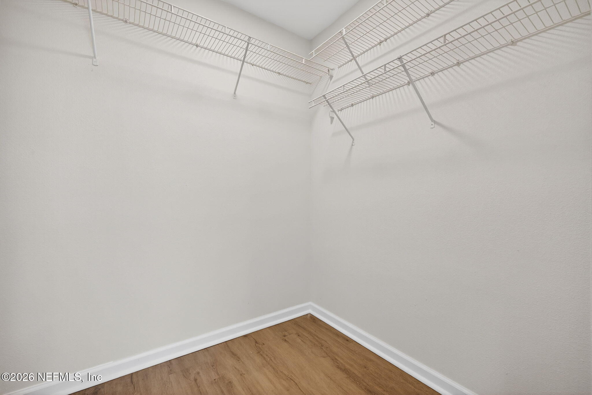 1610 Prestwick Place St. Augustine, FL 32086 - Photo 31 of 41 a view of a room with racks on the wall