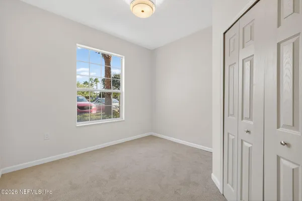 an empty room with windows