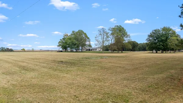 a kitchen with stainless steel appliances a refrigerator sink and microwave
