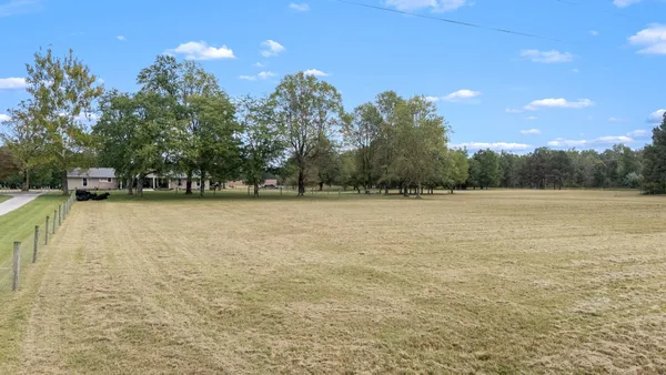 a room with furniture and wooden floor