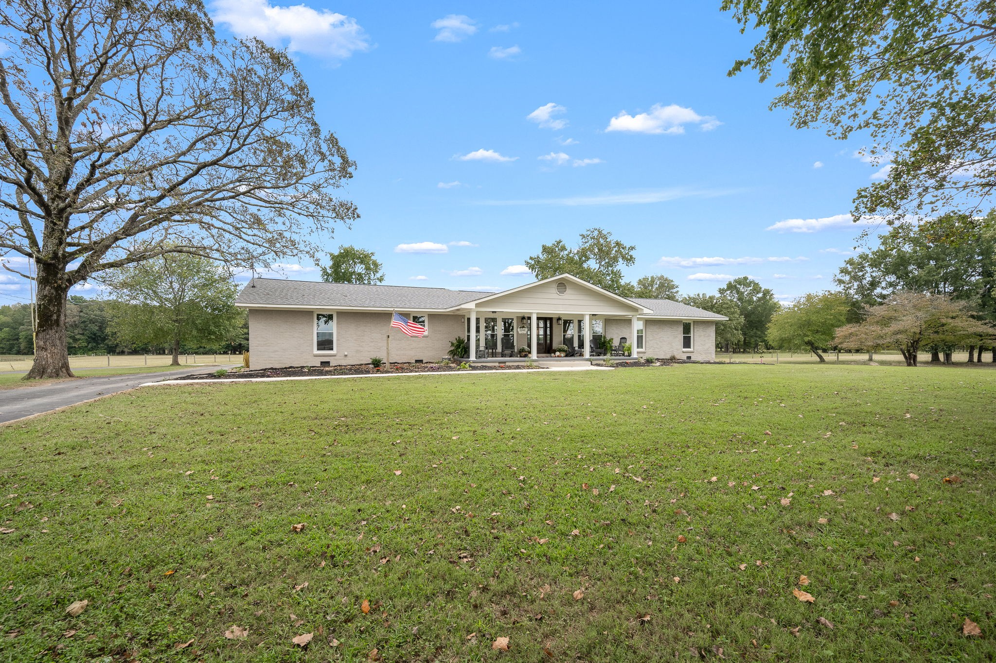 176 Terry Dunavan Road Elora, TN 37328 - Photo 20 of 85 a front view of house with yard and trees in the background