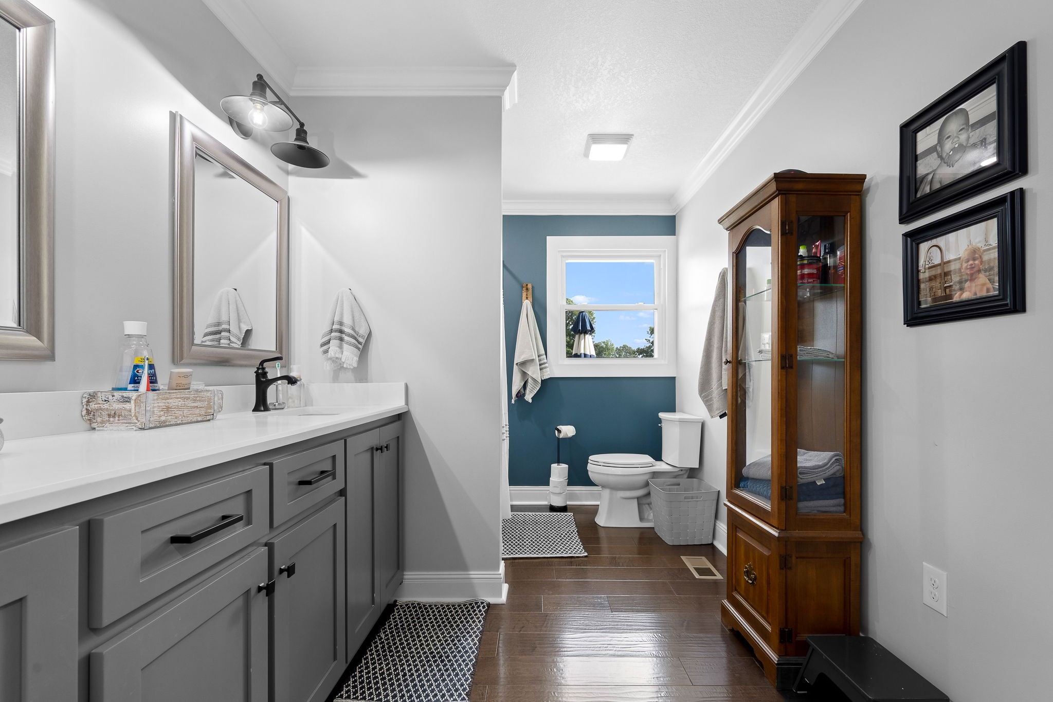 176 Terry Dunavan Road Elora, TN 37328 - Photo 64 of 85 a spacious bathroom with a double vanity sink toilet and a mirror