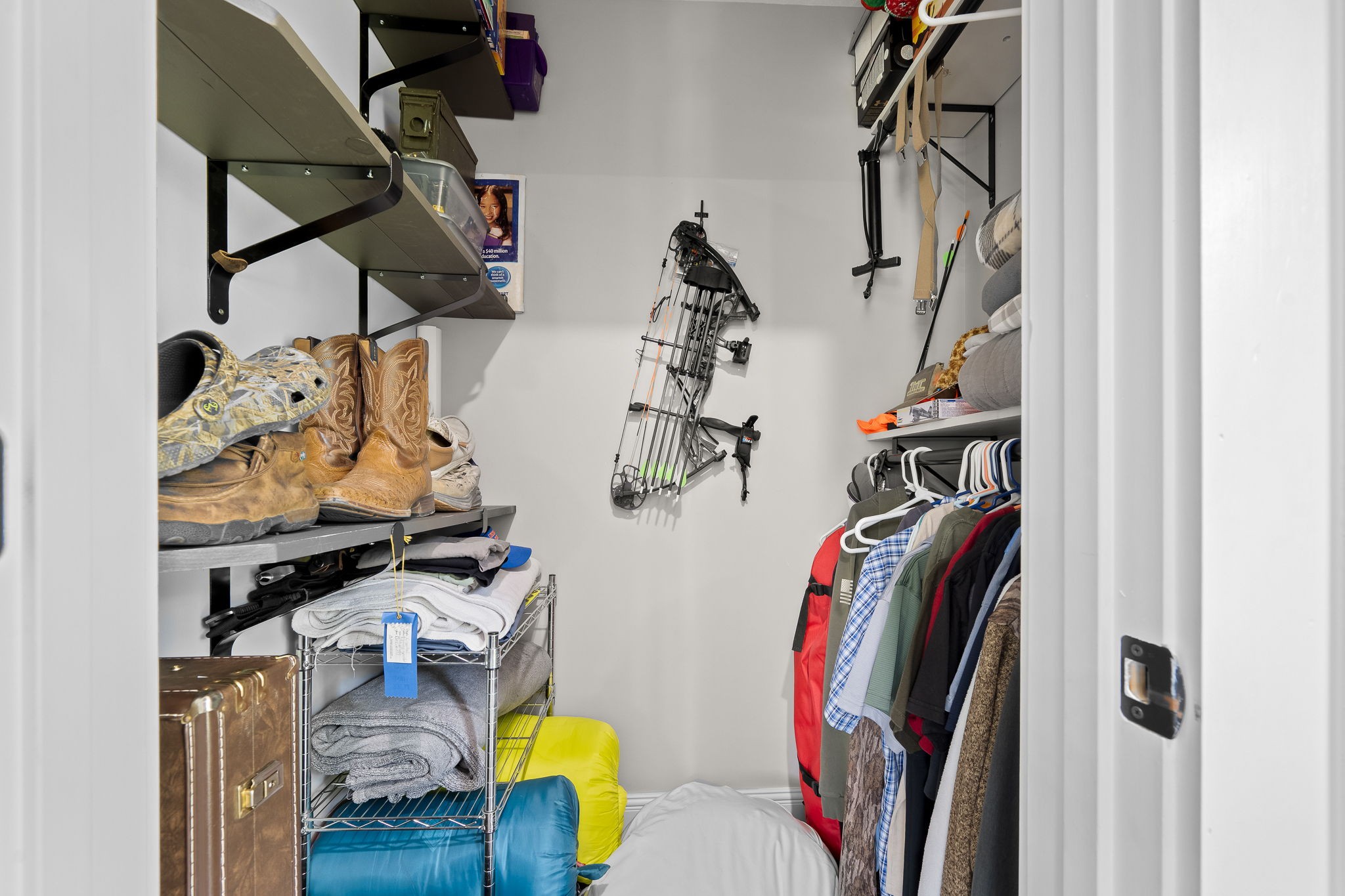 176 Terry Dunavan Road Elora, TN 37328 - Photo 68 of 85 a view of walk in closet with clothes and shoes