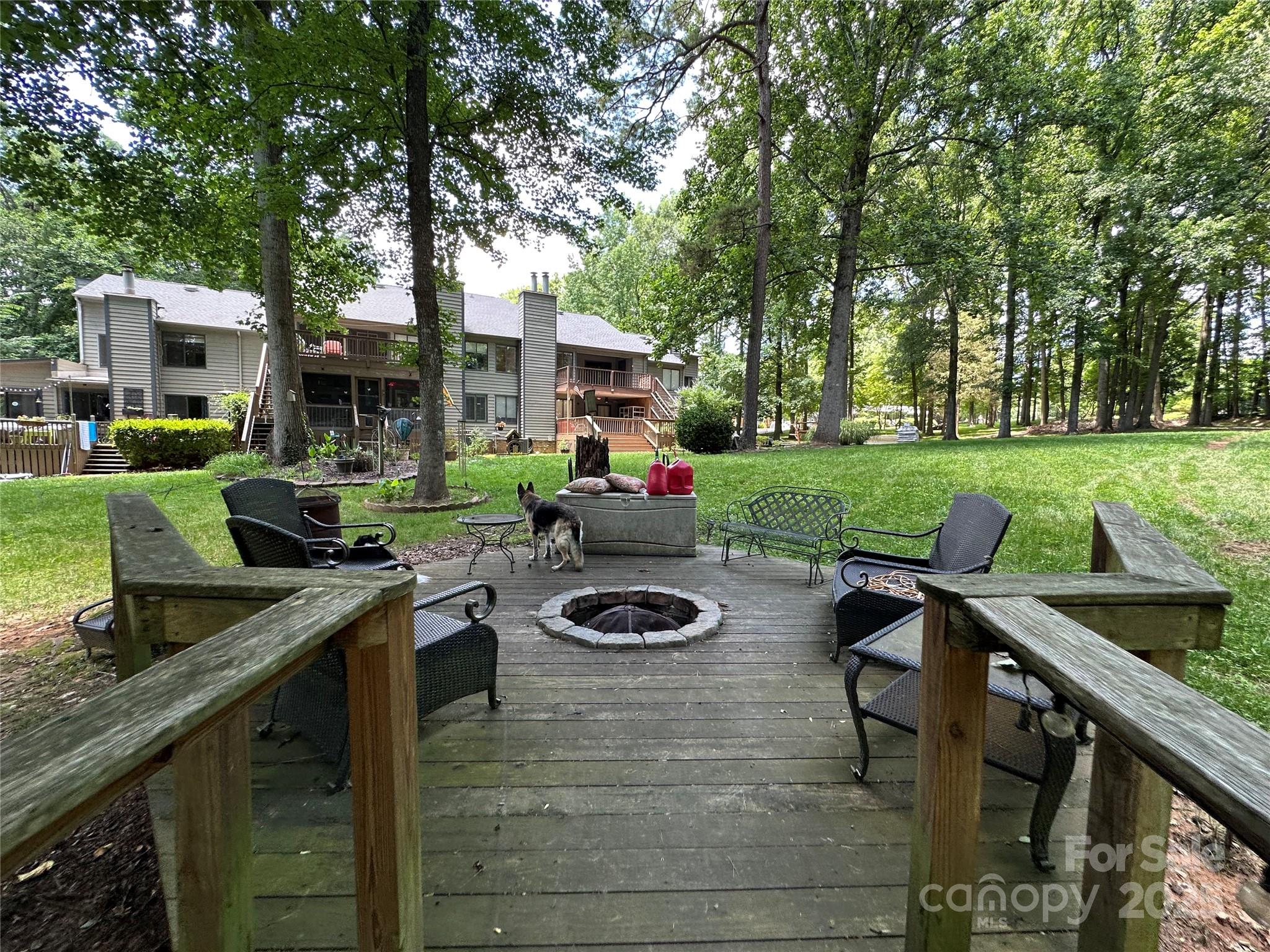 1590 Springpoint Road, Unit B Rock Hill, SC 29732 - Photo 38 of 39 a table and chairs sitting in front of a house
