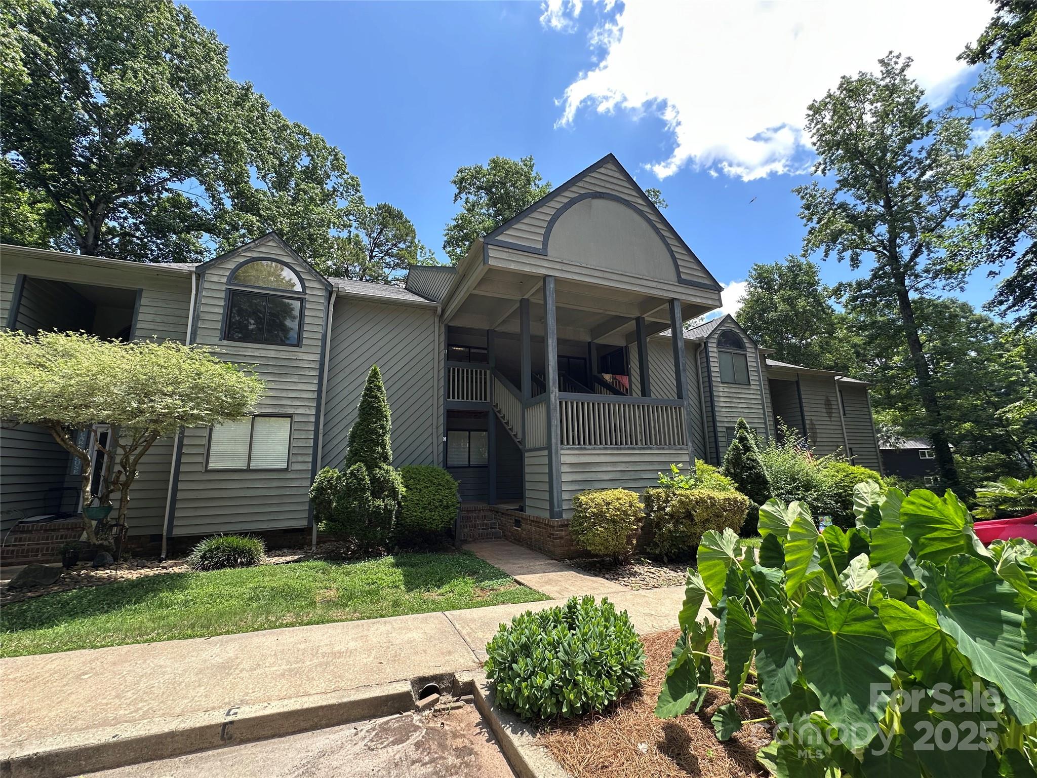 1590 Springpoint Road, Unit B Rock Hill, SC 29732 - Photo 4 of 39 front view of a house with a yard