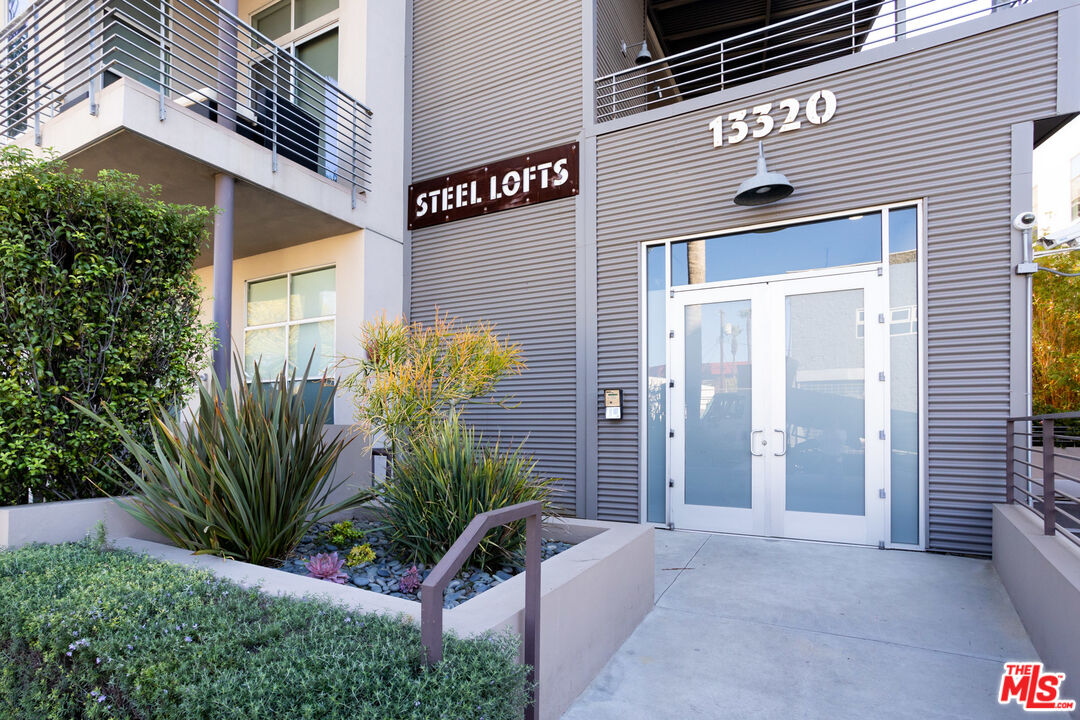 13320 Beach Avenue, Unit 304 Marina del Rey, CA 90292 - Photo 21 of 23 a view of a entryway door of the house