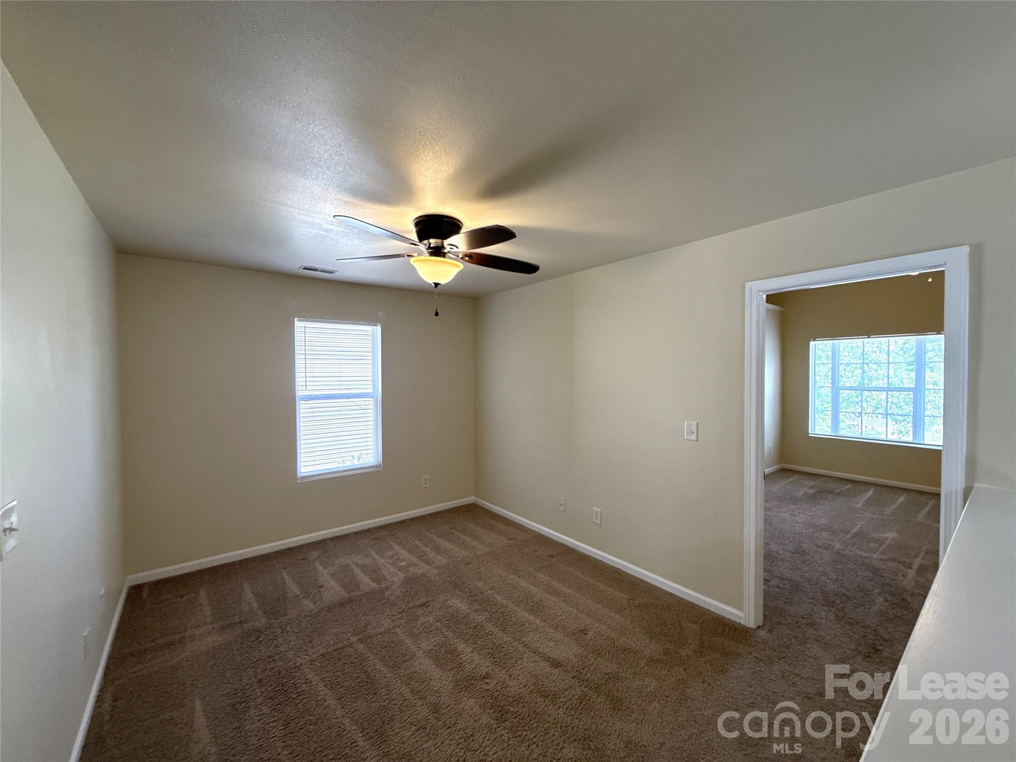 6831 Sunman Road Charlotte, NC 28216 - Photo 13 of 14 a view of an empty room with a window