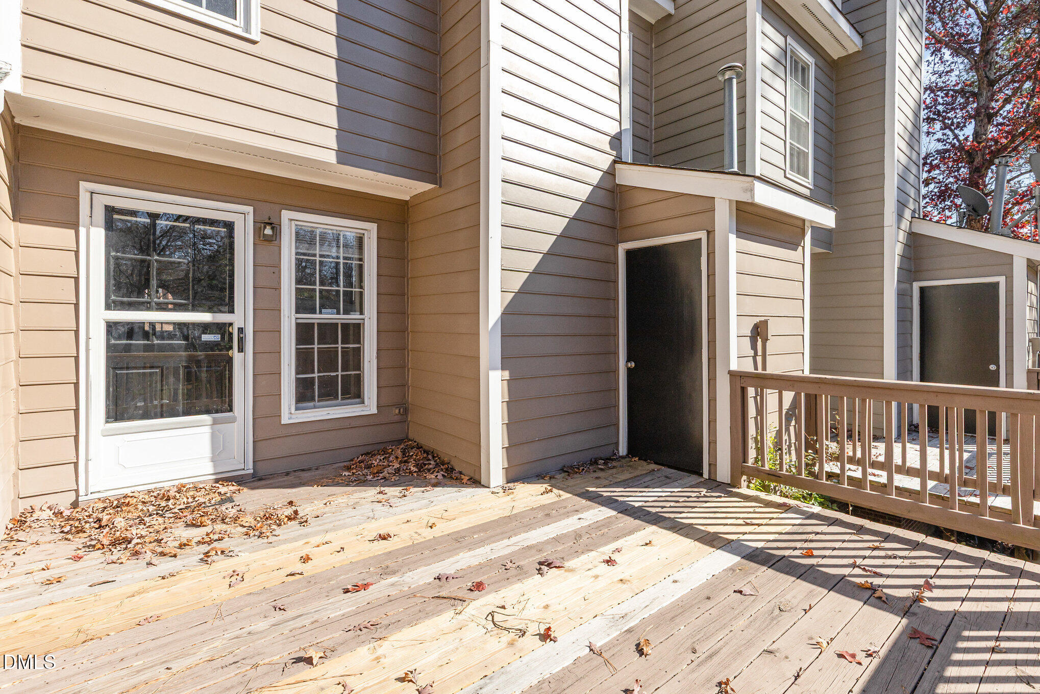 4534 Hamptonshire Drive Raleigh, NC 27613 - Photo 24 of 27 a view of a backyard with a balcony