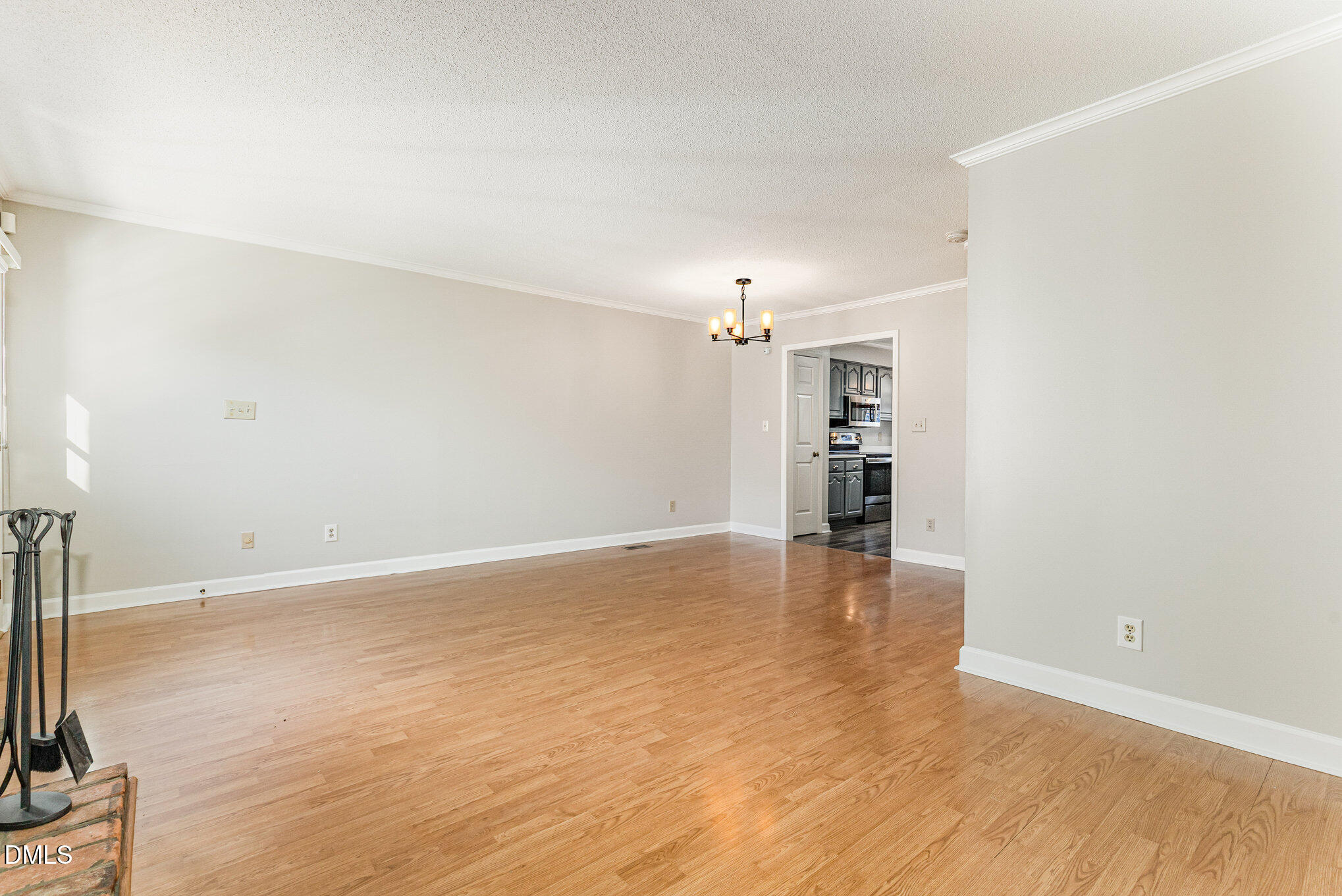4534 Hamptonshire Drive Raleigh, NC 27613 - Photo 5 of 27 wooden floor in an empty room