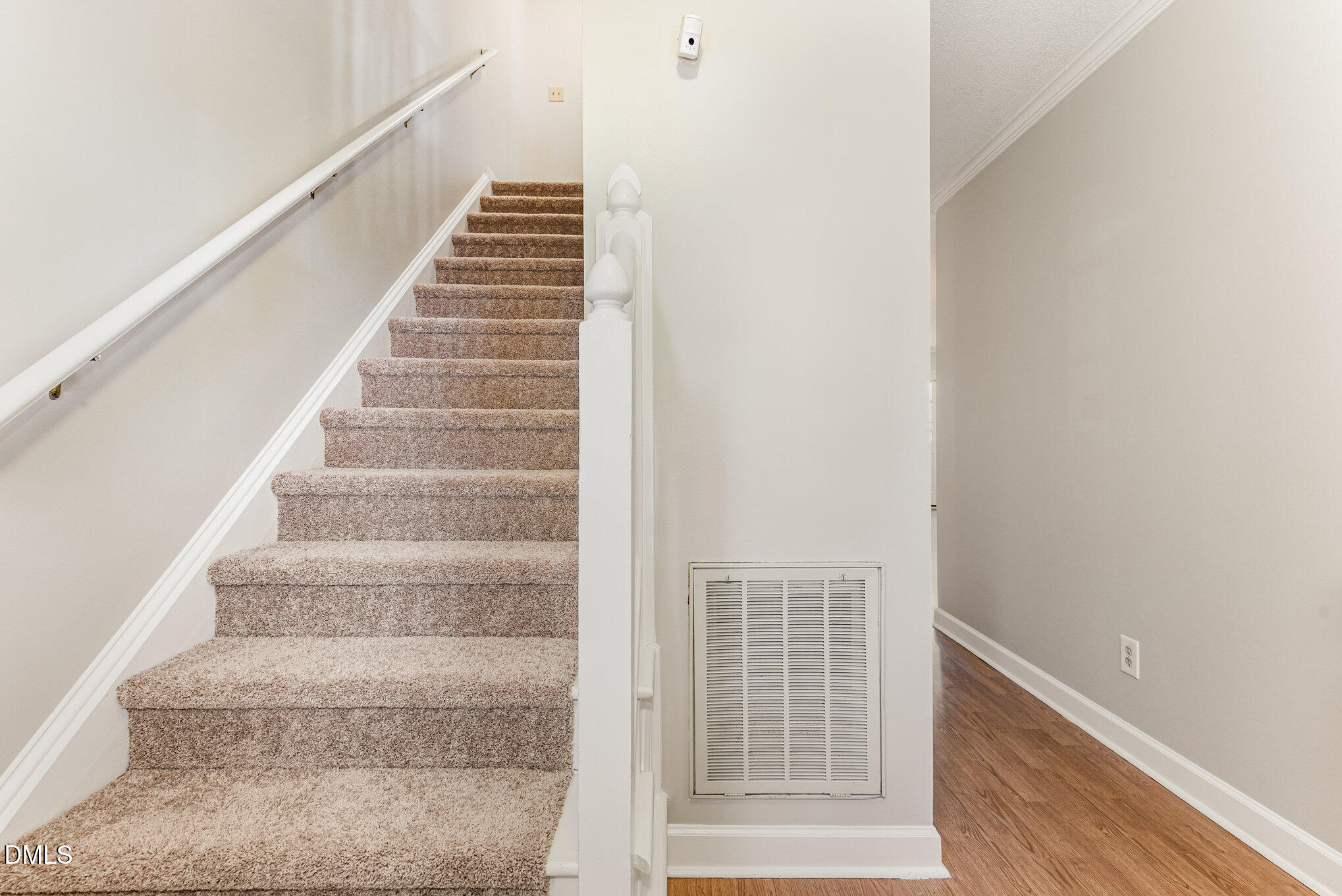 4534 Hamptonshire Drive Raleigh, NC 27613 - Photo 9 of 27 a view of staircase with white walls