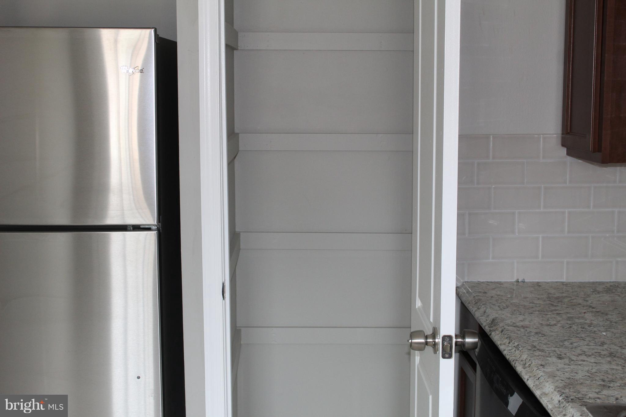 650 Queensgate Road Baltimore, MD 21229 - Photo 10 of 25 a view of a kitchen from the hallway