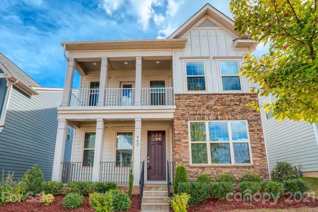 942 Emory Lane Fort Mill, SC 29708 - Photo 1 of 33 front view of a brick house with a large windows