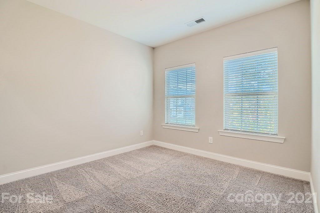 942 Emory Lane Fort Mill, SC 29708 - Photo 22 of 33 an empty room with a window