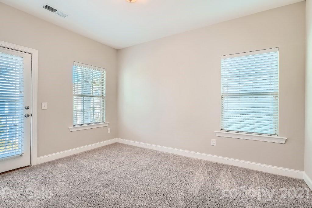 942 Emory Lane Fort Mill, SC 29708 - Photo 24 of 33 an empty room with windows