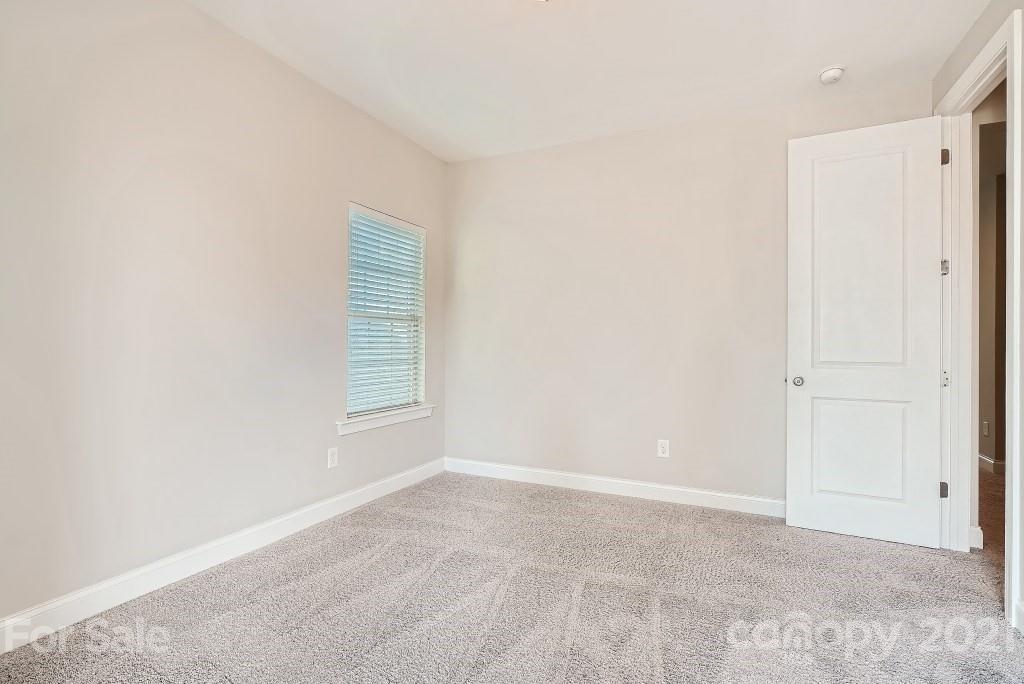 942 Emory Lane Fort Mill, SC 29708 - Photo 25 of 33 a view of an empty room with a window