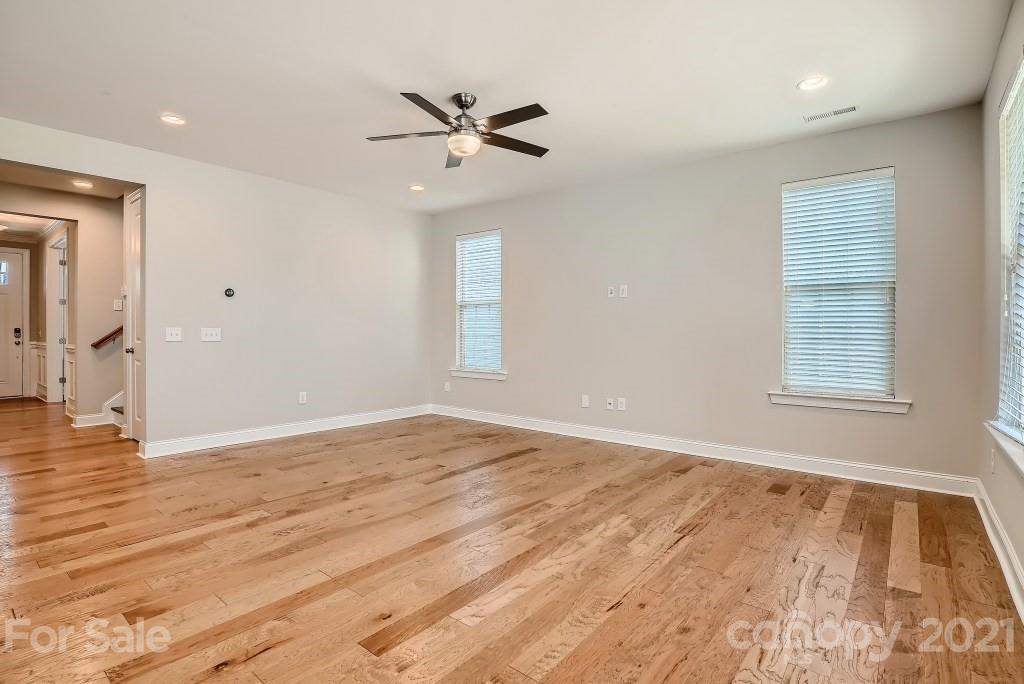 942 Emory Lane Fort Mill, SC 29708 - Photo 4 of 33 wooden floor in an empty room with a window