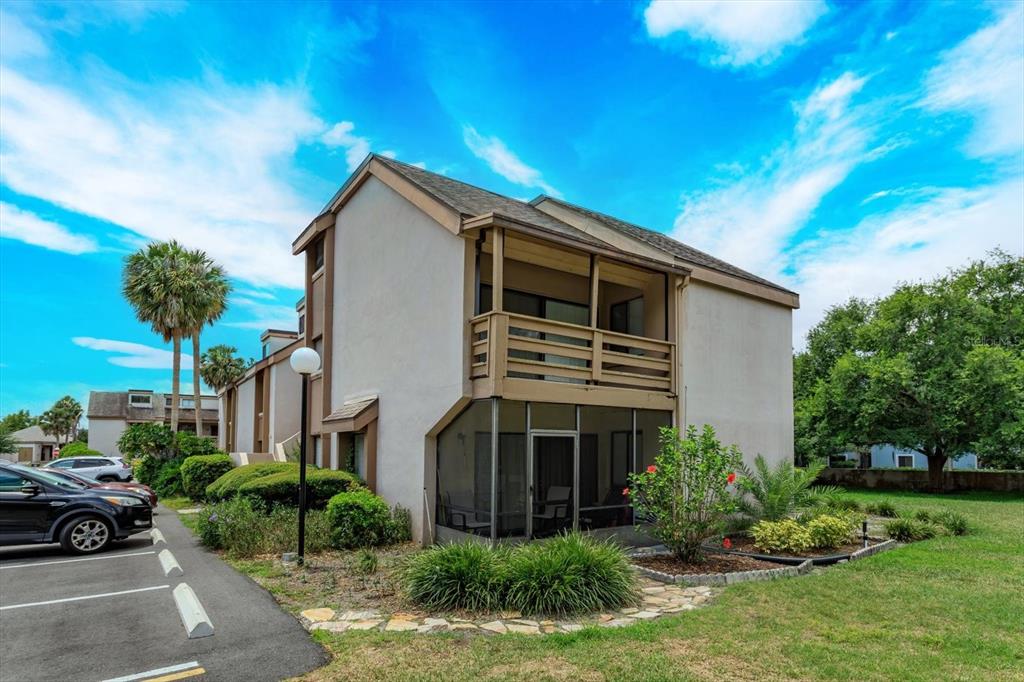 240 Orienta Point Street, Unit 240 Altamonte Springs, FL 32701 - Photo 16 of 20 a view of a house with a yard