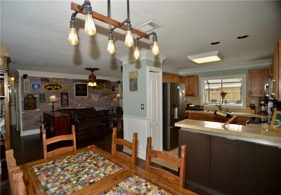 9812 Spanish Isles Drive Boca Raton, FL 33496 - Photo 11 of 44 a kitchen with stainless steel appliances kitchen island granite countertop a sink stove and refrigerator