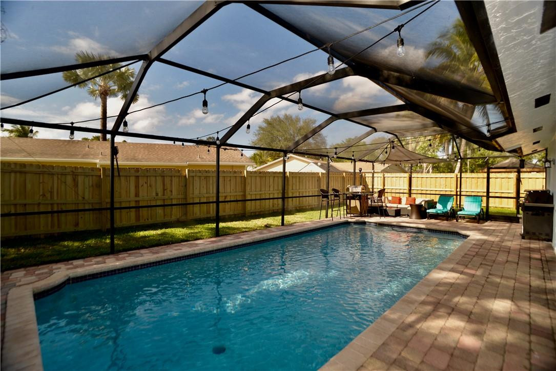 9812 Spanish Isles Drive Boca Raton, FL 33496 - Photo 2 of 44 a view of swimming pool