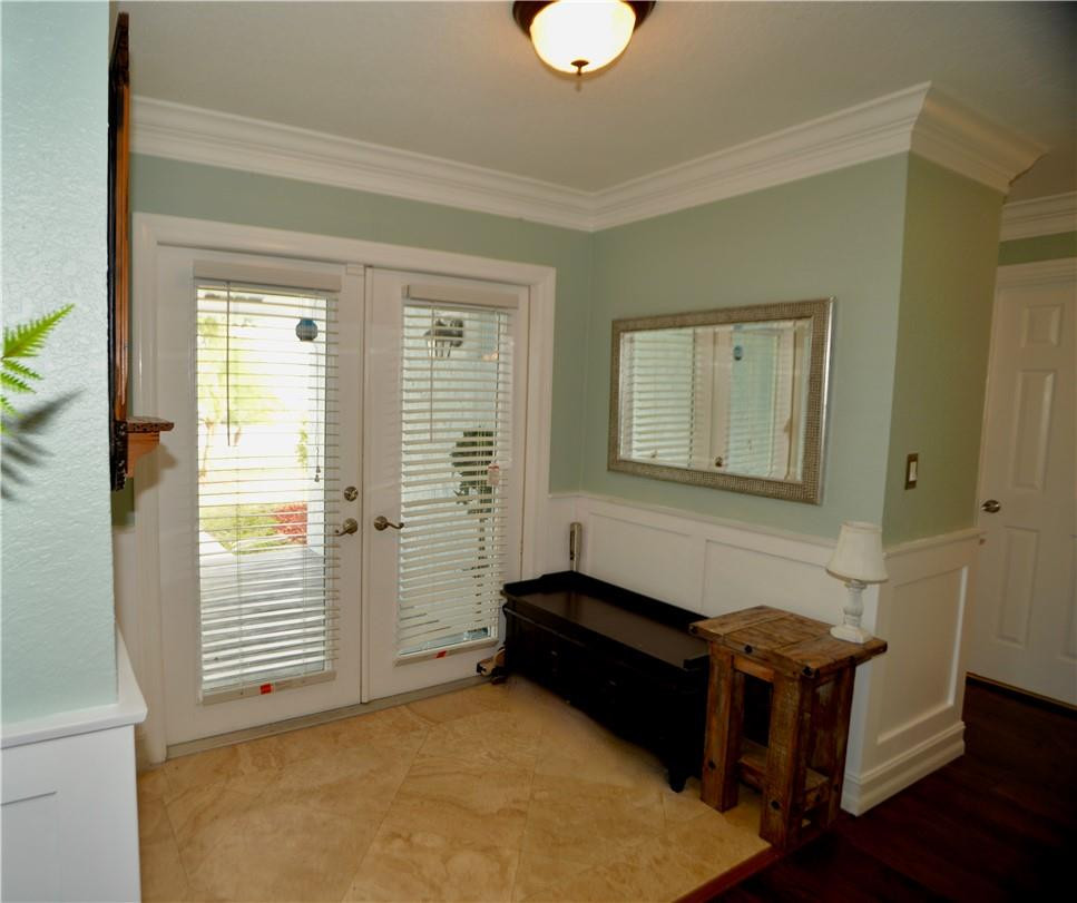 9812 Spanish Isles Drive Boca Raton, FL 33496 - Photo 3 of 44 a room with furniture and a window