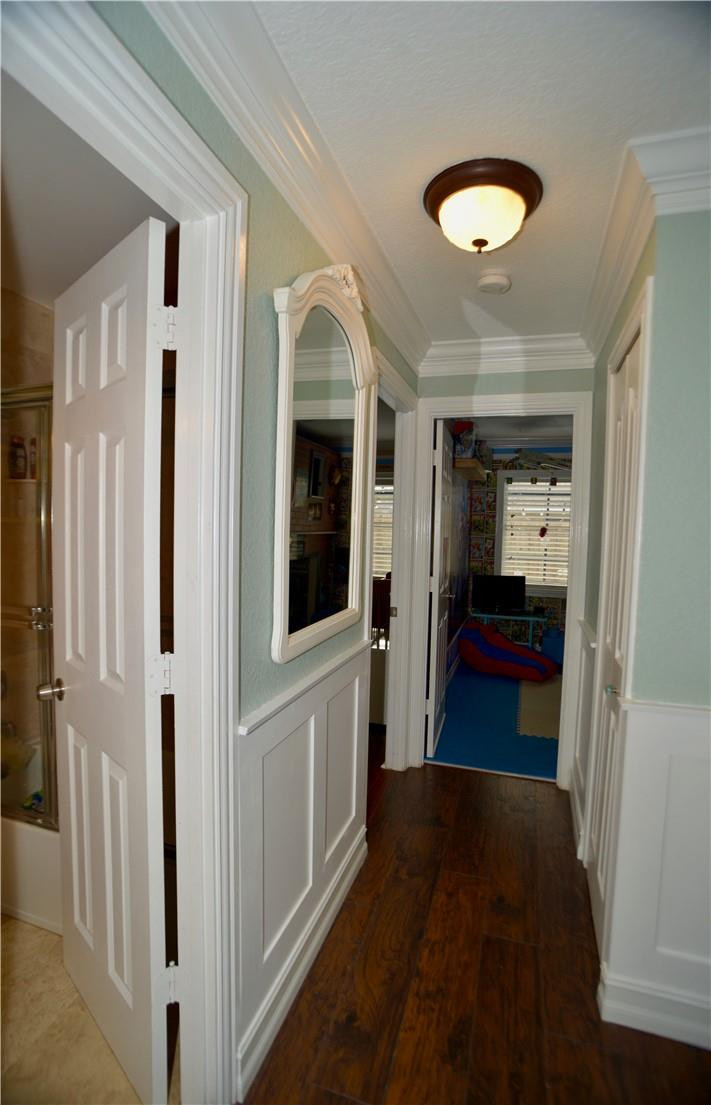 9812 Spanish Isles Drive Boca Raton, FL 33496 - Photo 31 of 44 a view of hallway with sink and wooden floor