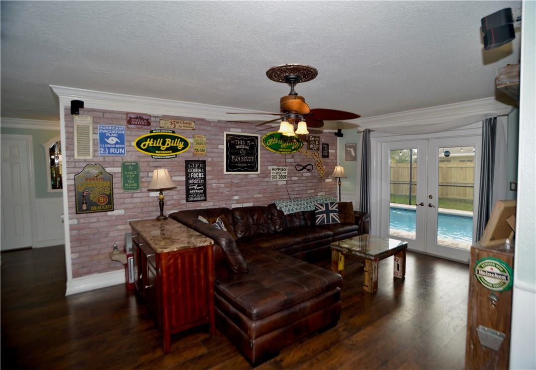 9812 Spanish Isles Drive Boca Raton, FL 33496 - Photo 6 of 44 a living room with furniture and wooden floor