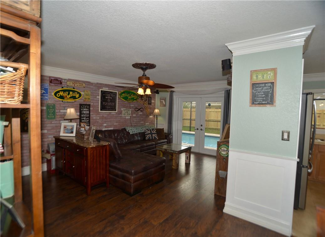 9812 Spanish Isles Drive Boca Raton, FL 33496 - Photo 7 of 44 a living room with furniture and wooden floor