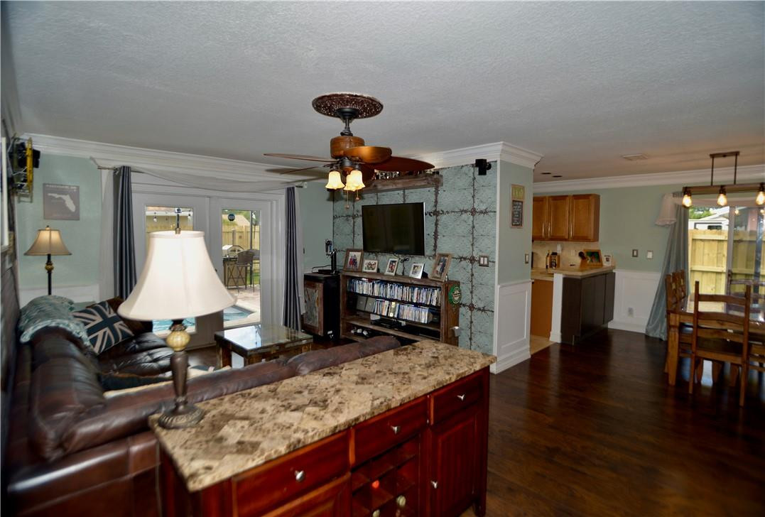 9812 Spanish Isles Drive Boca Raton, FL 33496 - Photo 10 of 44 a living room with furniture and a wooden floor