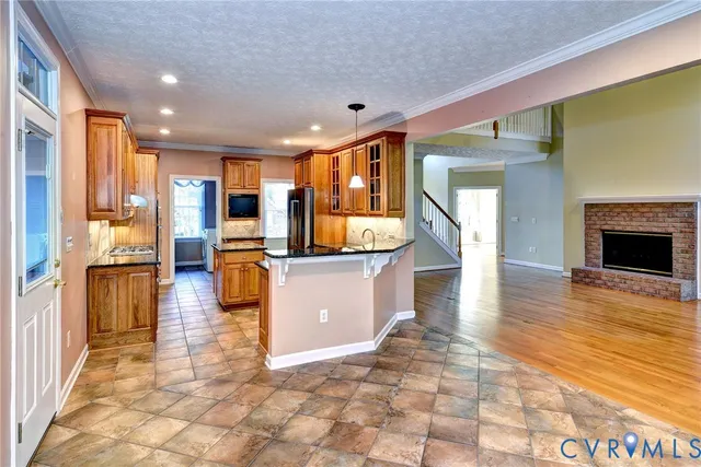 a lobby with furniture and floor to ceiling window
