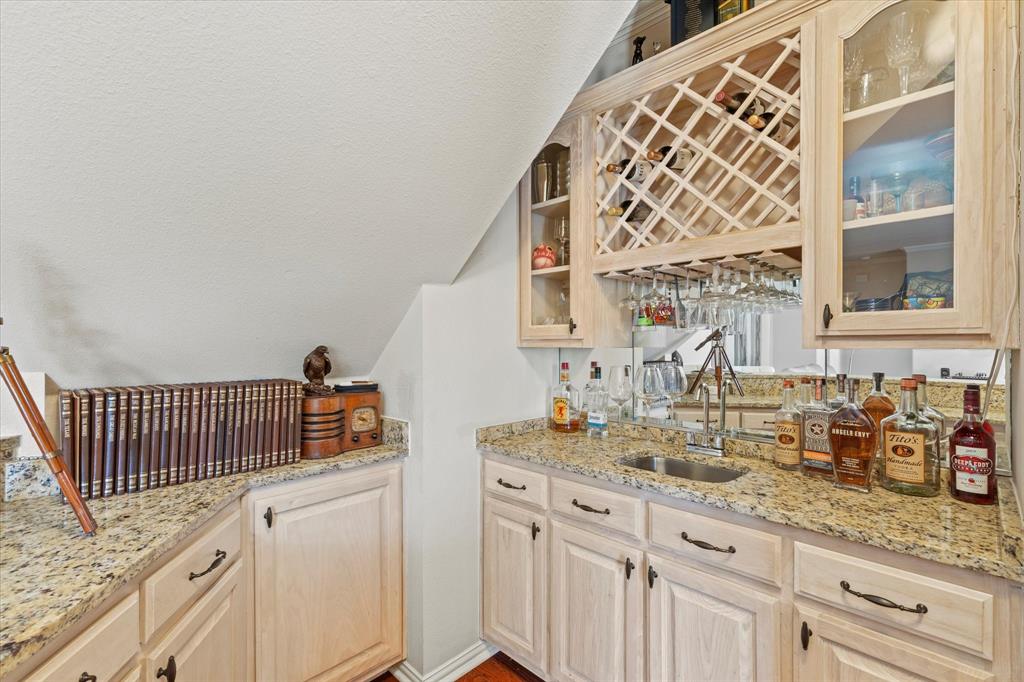 3710 Sam Rayburn Trail Dallas, TX 75287 - Photo 11 of 36 a bathroom with a sink and a mirror