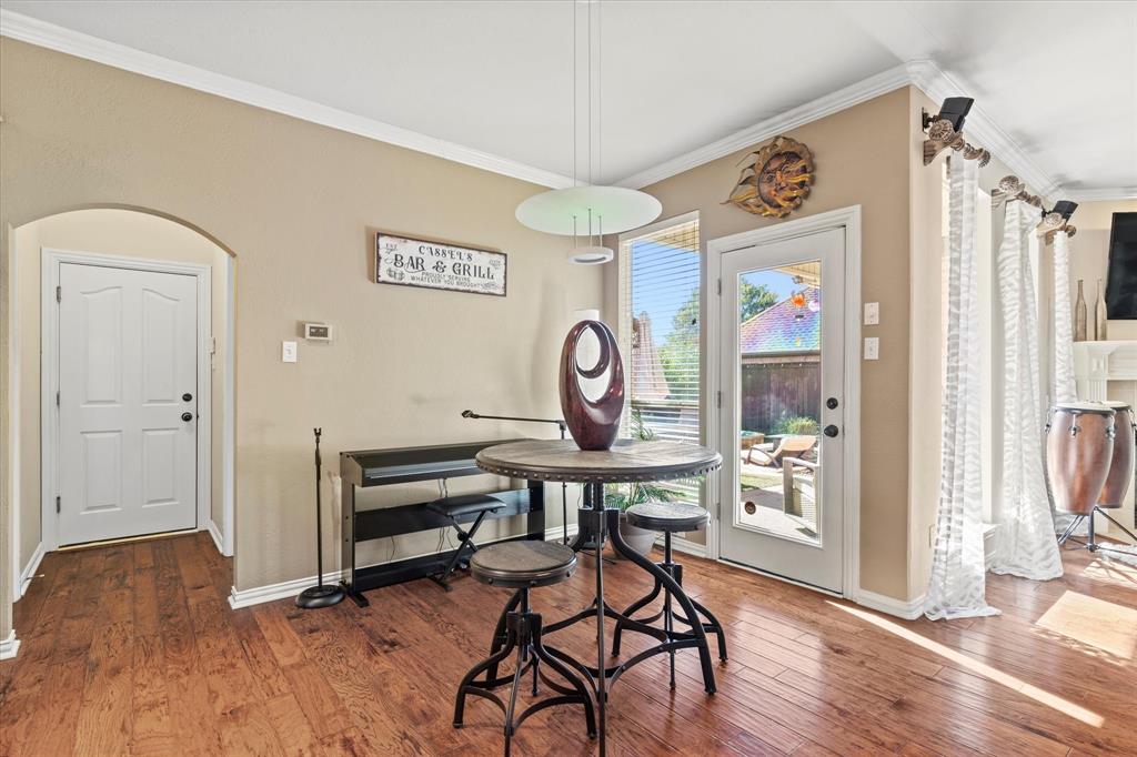 3710 Sam Rayburn Trail Dallas, TX 75287 - Photo 13 of 36 a view of a workspace with furniture and a window