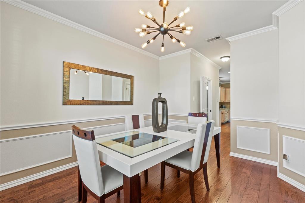 3710 Sam Rayburn Trail Dallas, TX 75287 - Photo 4 of 36 a view of a dining room with furniture and wooden floor
