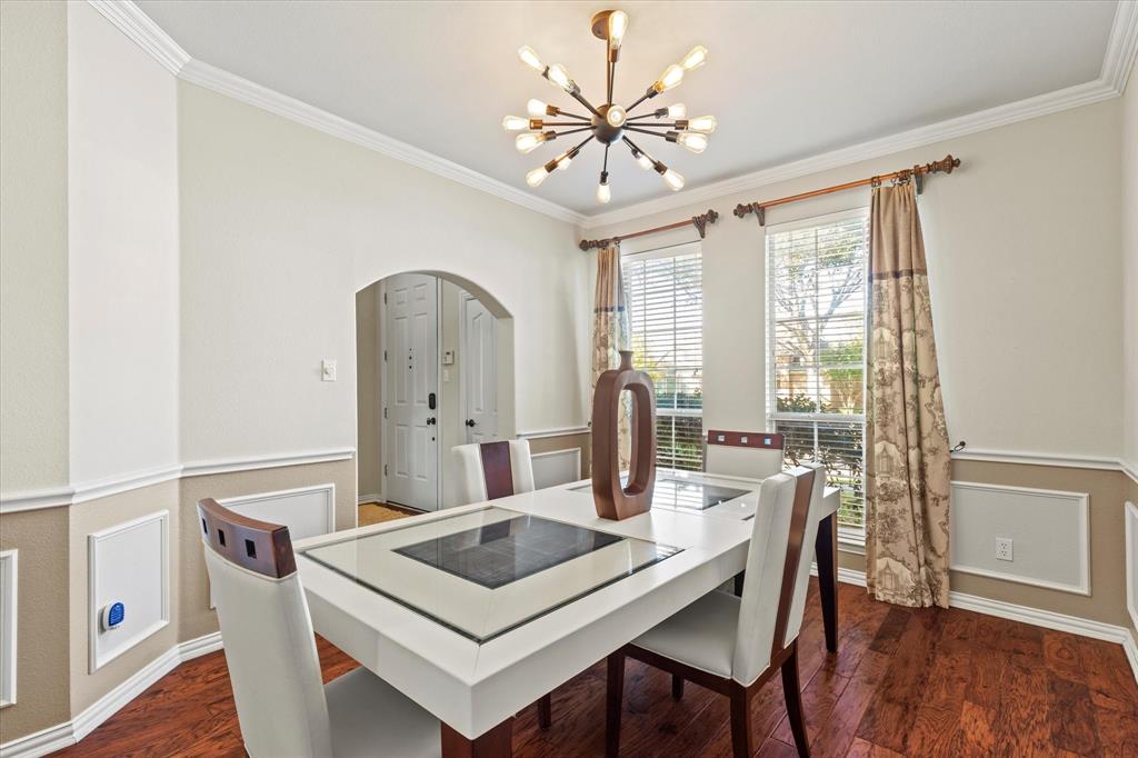 3710 Sam Rayburn Trail Dallas, TX 75287 - Photo 5 of 36 a view of a dining room with furniture window and wooden floor