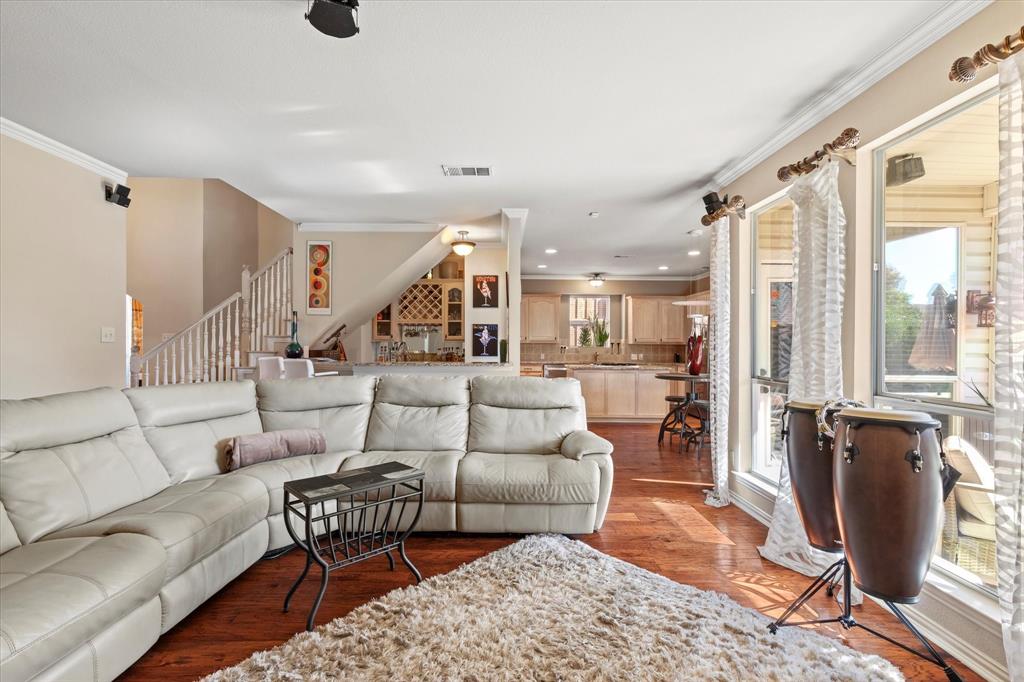 3710 Sam Rayburn Trail Dallas, TX 75287 - Photo 8 of 36 a living room with furniture rug and wooden floor