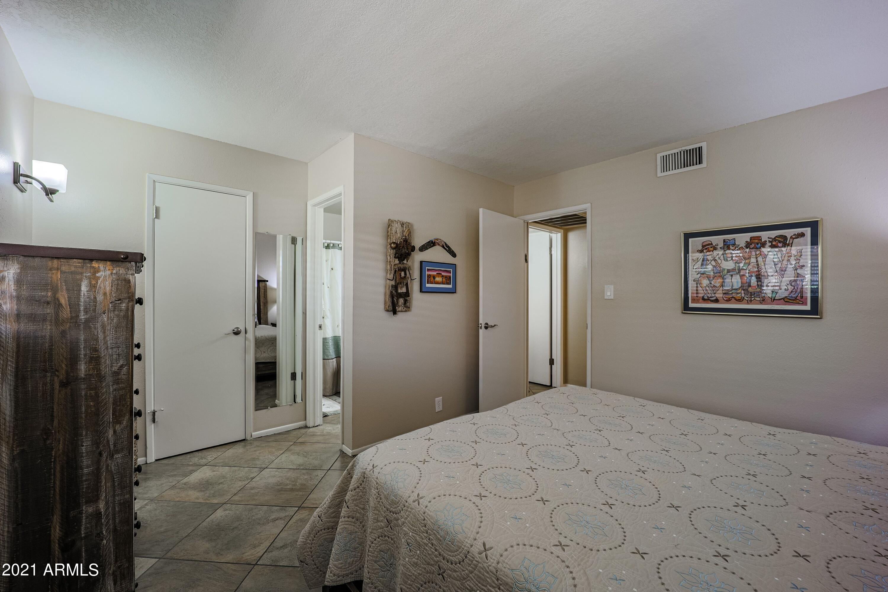 1320 East Bethany Home Road, Unit 43 Phoenix, AZ 85014 - Photo 12 of 35 Master Walk-In Closet & Bath