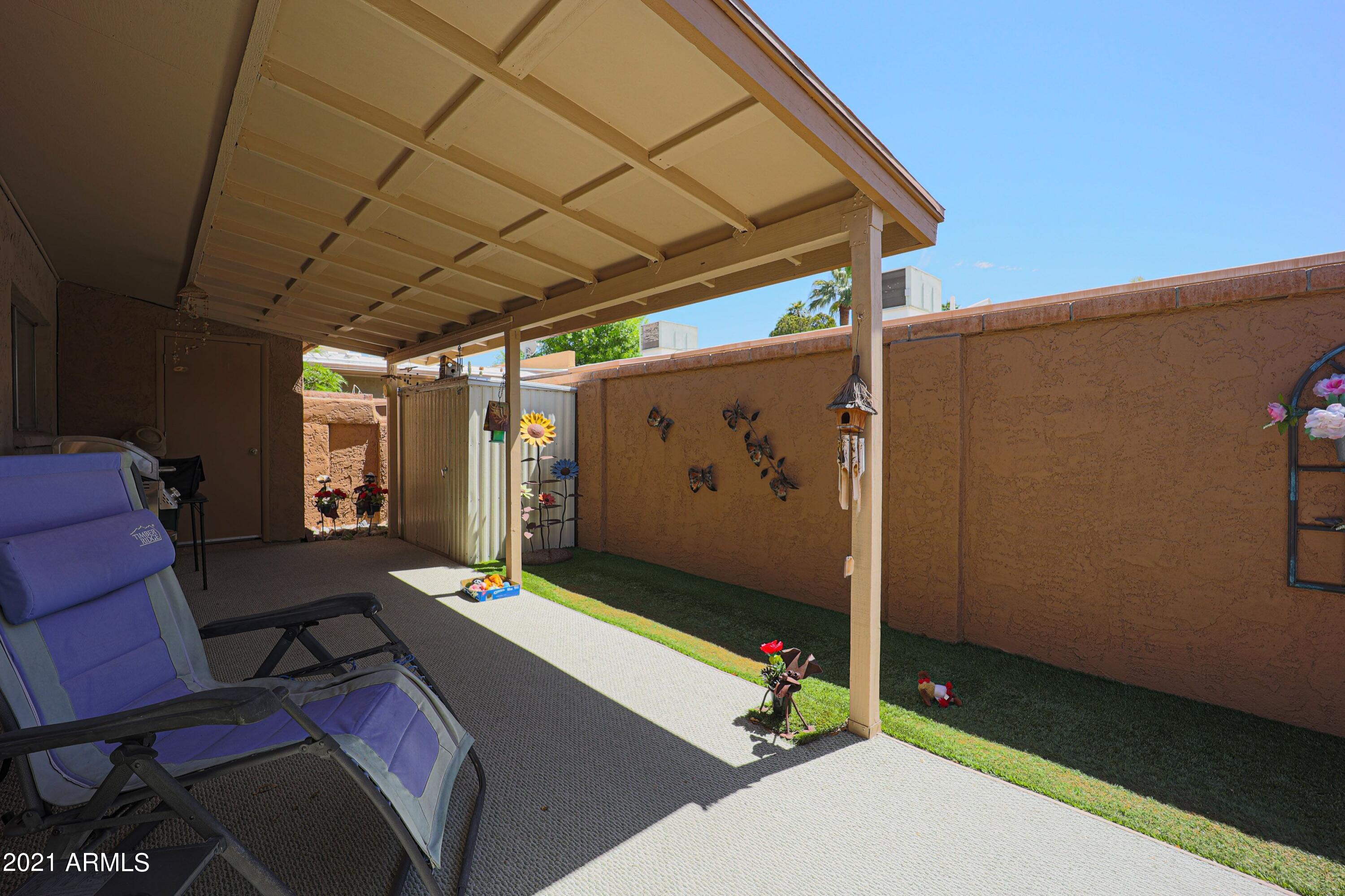 1320 East Bethany Home Road, Unit 43 Phoenix, AZ 85014 - Photo 23 of 35 Backyard Extended Patio Cover