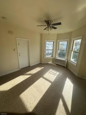 a kitchen that has a sink and a stove