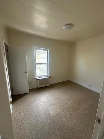 an empty room with a natural light