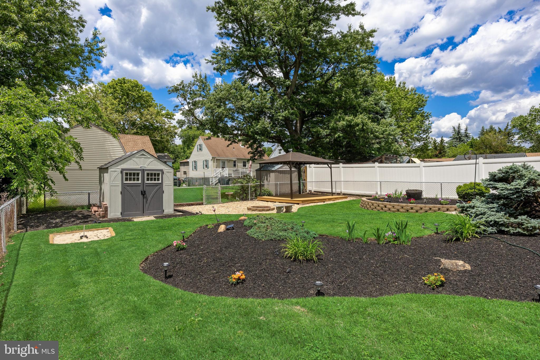 937 Clements Bridge Road Barrington, NJ 08007 - Photo 6 of 34 a view of a house with a yard and sitting area