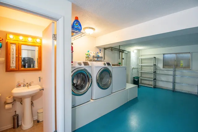 a utility room with dryer and washer