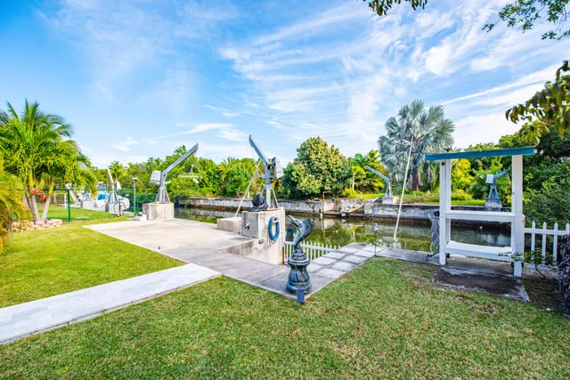 a view of swimming pool with a patio