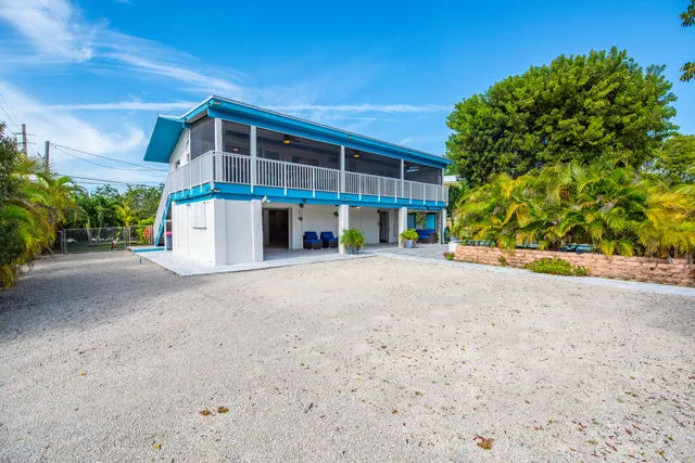 a view of a house with a street