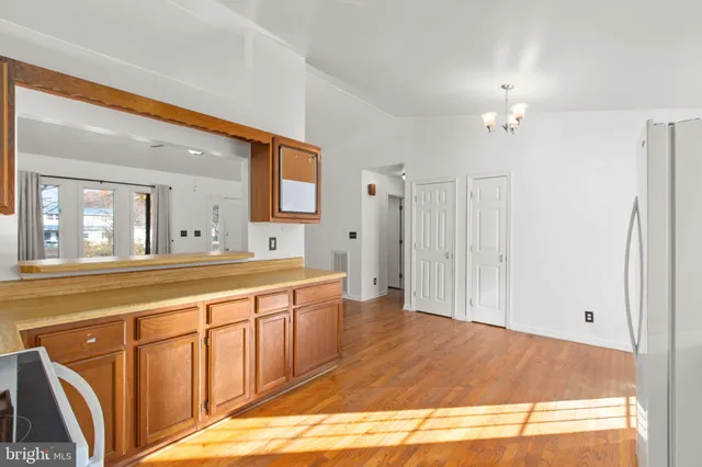 a spacious bathroom with a sink and a mirror