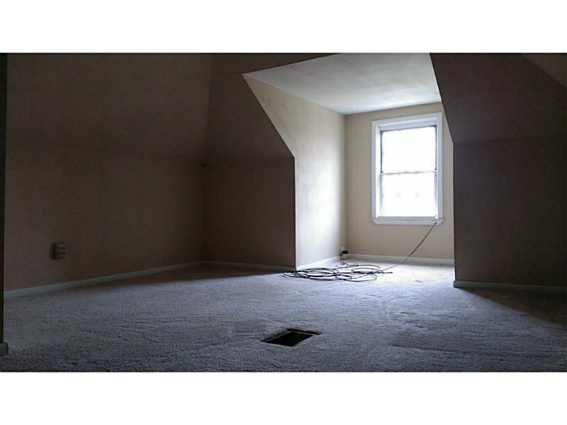 528 Beaver Road Ambridge, PA 15003 - Photo 12 of 12 Master Bedroom. The large 3rd floor master suite has so much character with the dormer window.
