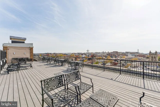 a view of a terrace with seating area